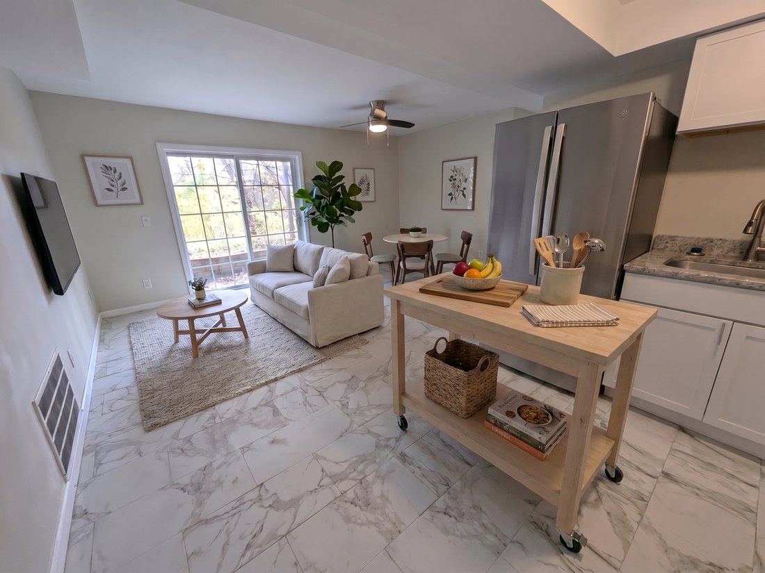 Bright living space with natural light at a Totoket Meadows home